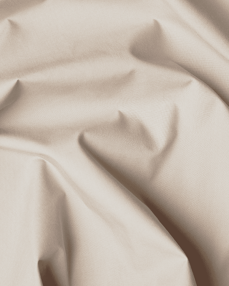 Nahaufnahme der beigen OEKO-TEX®-zertifizierten Baumwolle des Bedskirts